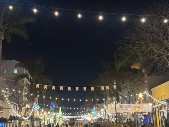 Finished downtown string lighting glowing at night