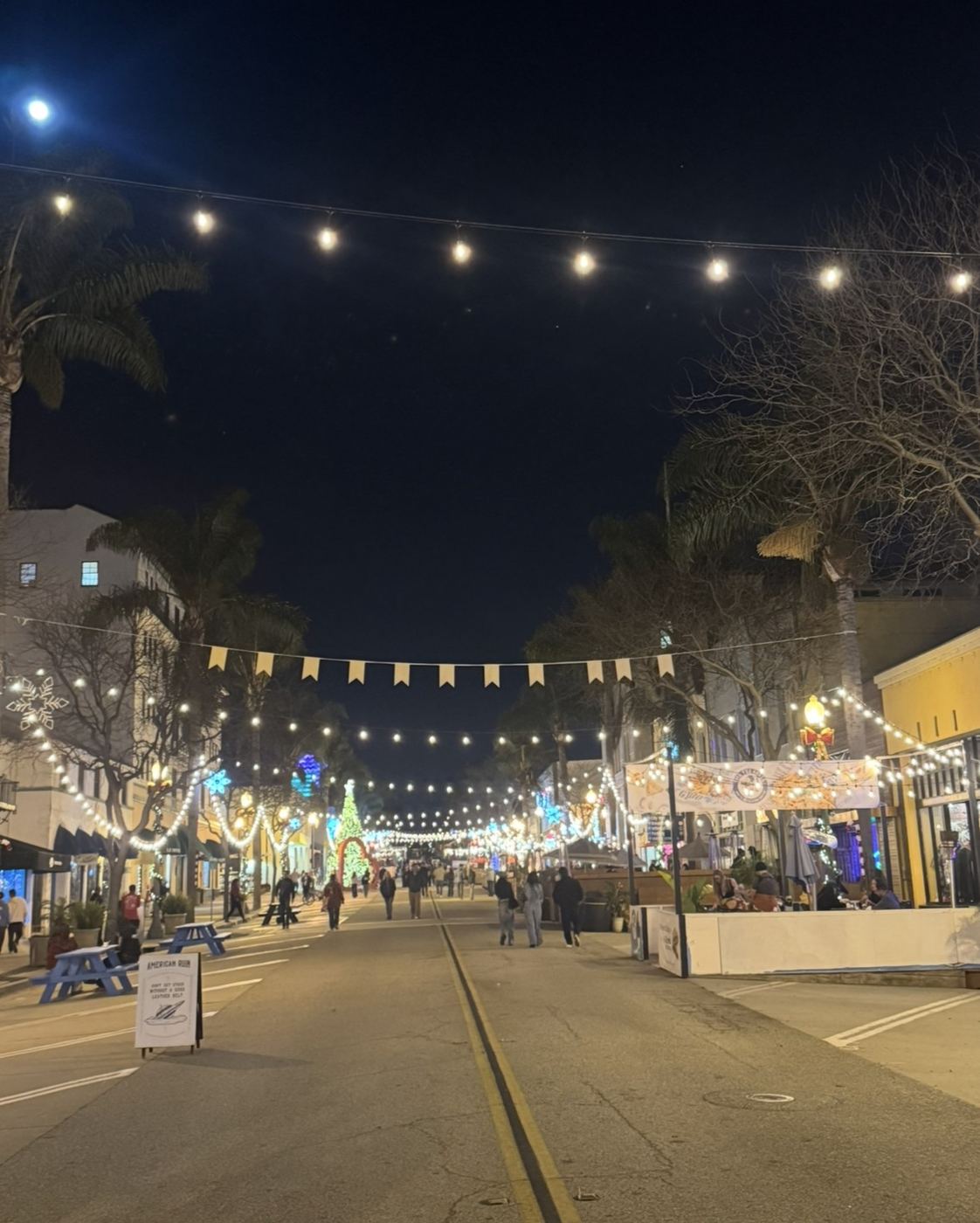 The finished downtown string lighting glowing at night