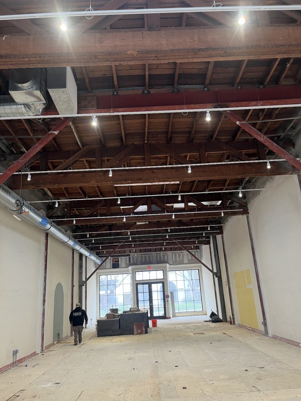 Historic brick-and-timber TI shell with new track lighting
