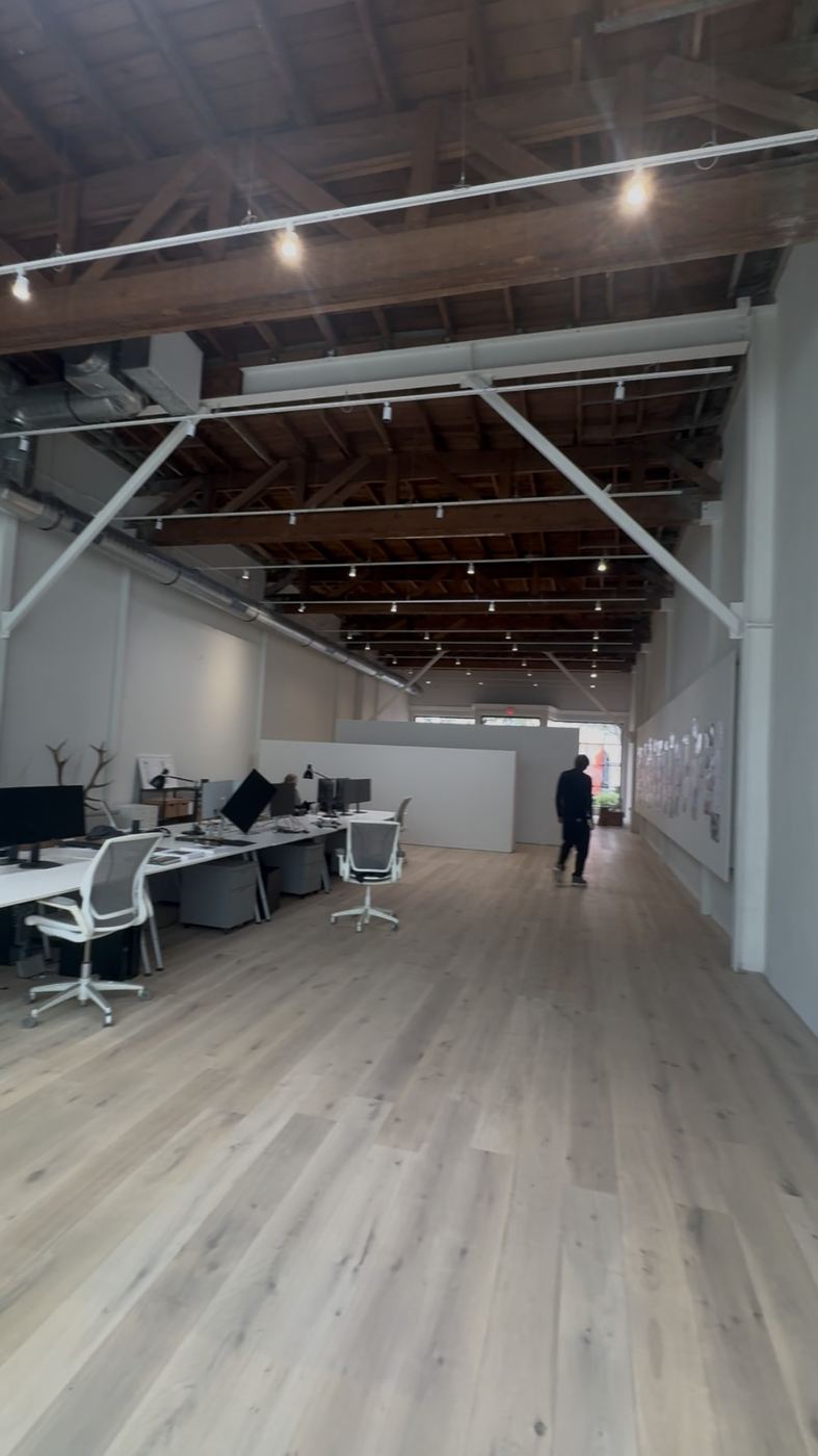 Finished office TI - white oak floors, exposed painted trusses