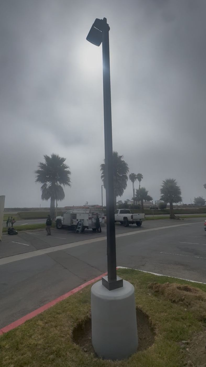 Finished light pole on its concrete base